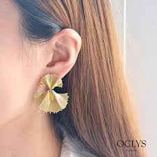 Boucles d'oreilles clip pendantes fleur acier inoxydable Sina (Doré)